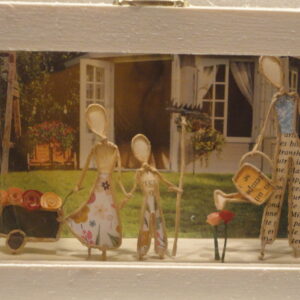 Poésie de papier: famille au jardin